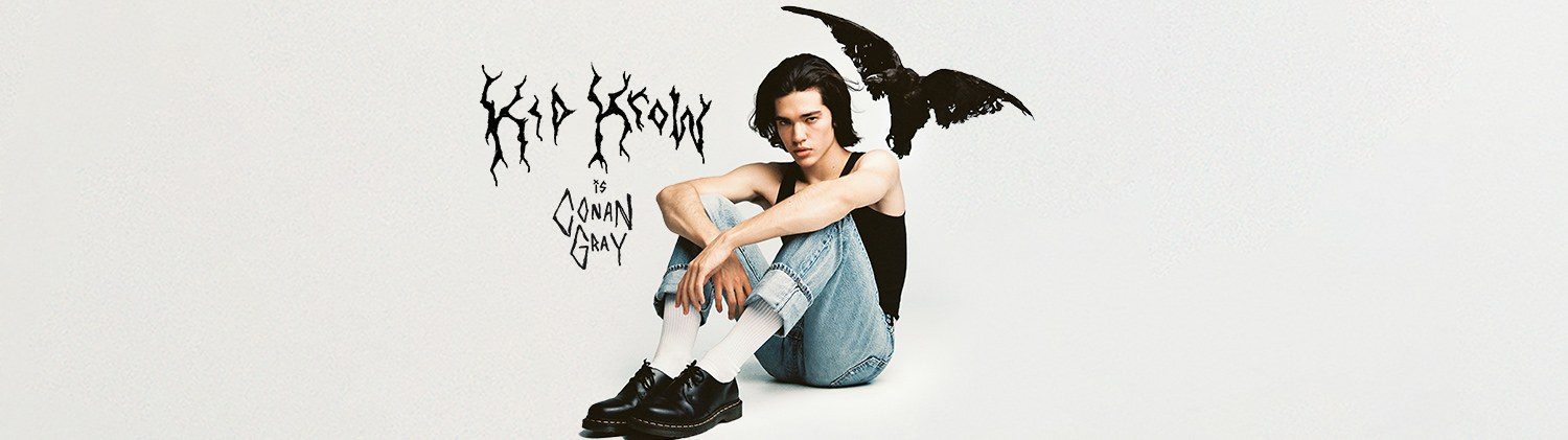 Header: the artist seated on white with a crow, hand-lettered title