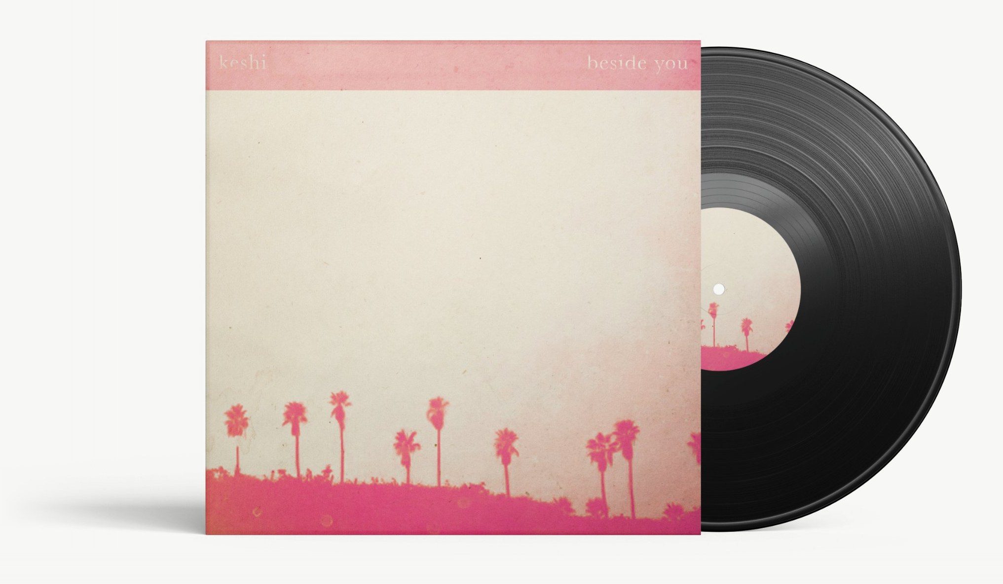 keshi, beside you on vinyl: a faded cream sleeve with a row of pink palm trees along the bottom edge, name and title set small in a pink band across the top
