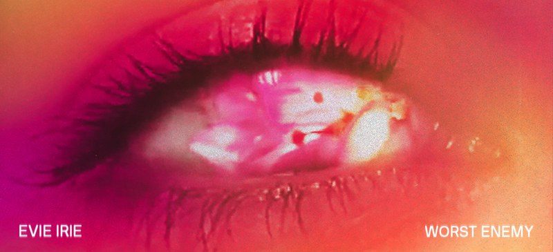 Social promo: an extreme close-up of an eye in pink and red